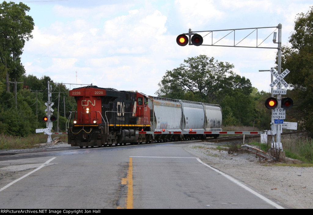 CN 2228 rolls across Griswold Rd with L533